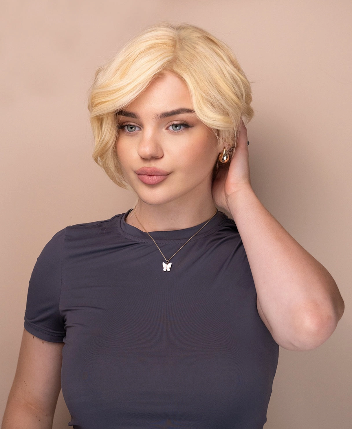 asymmetric wedge human wig - 6" light blonde.