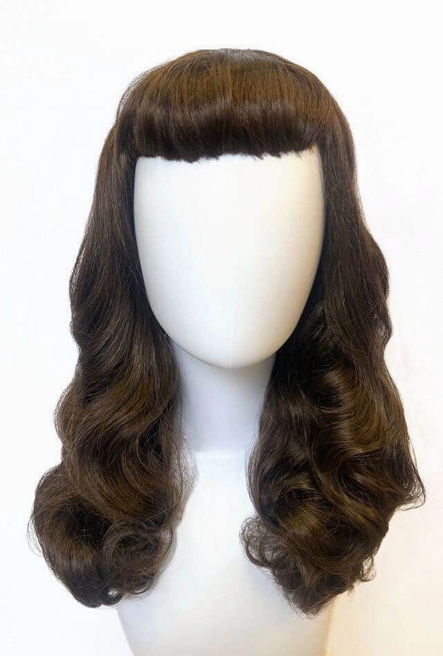 Brown 1950s pinup style wig, with long waves and a short fringe: Rosie
