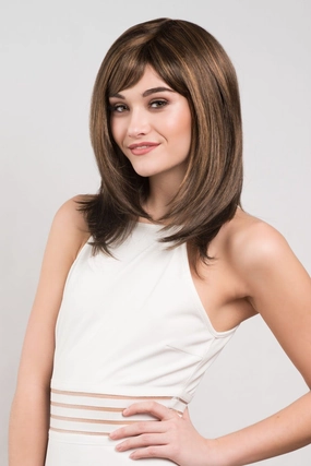 Chocolate brown wig with blonde highlights, face frame style: Katie