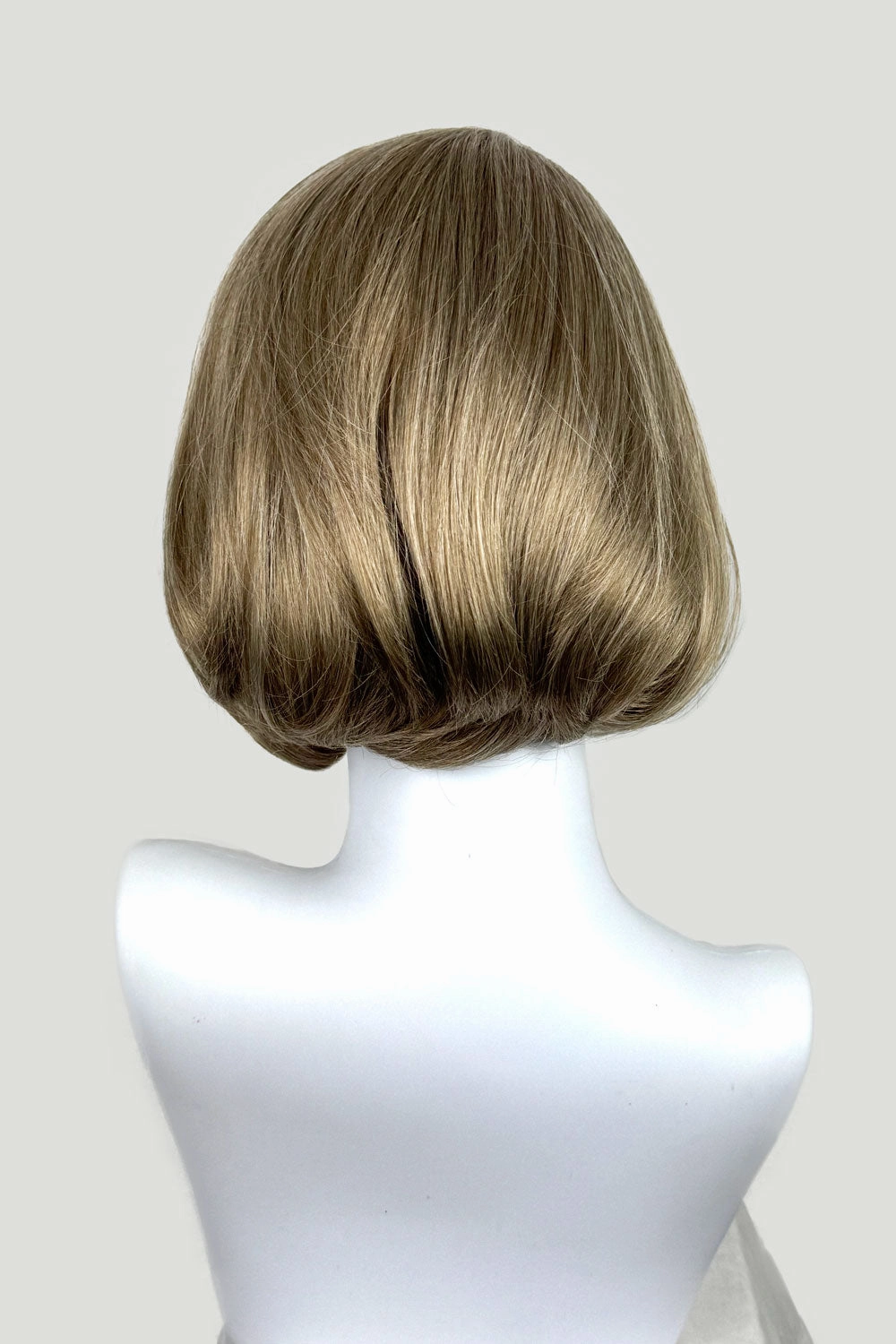 Dark golden wig, lace front, rockabilly style with victory rolls: Bobbie