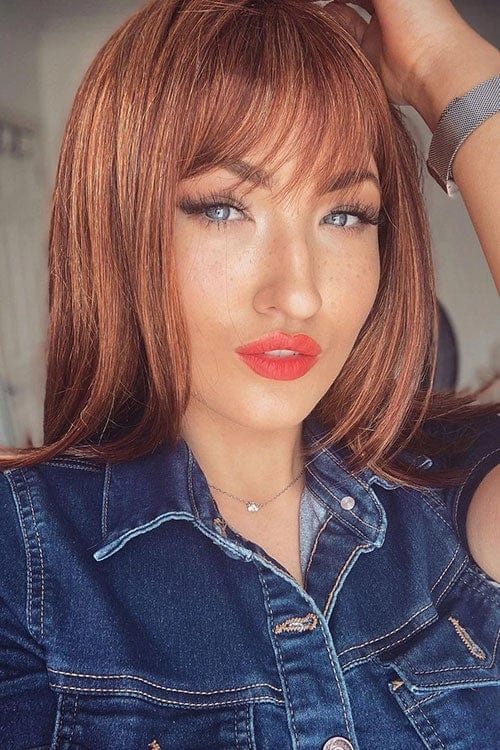 Gingery auburn wig with blonde highlights face frame style: Geri