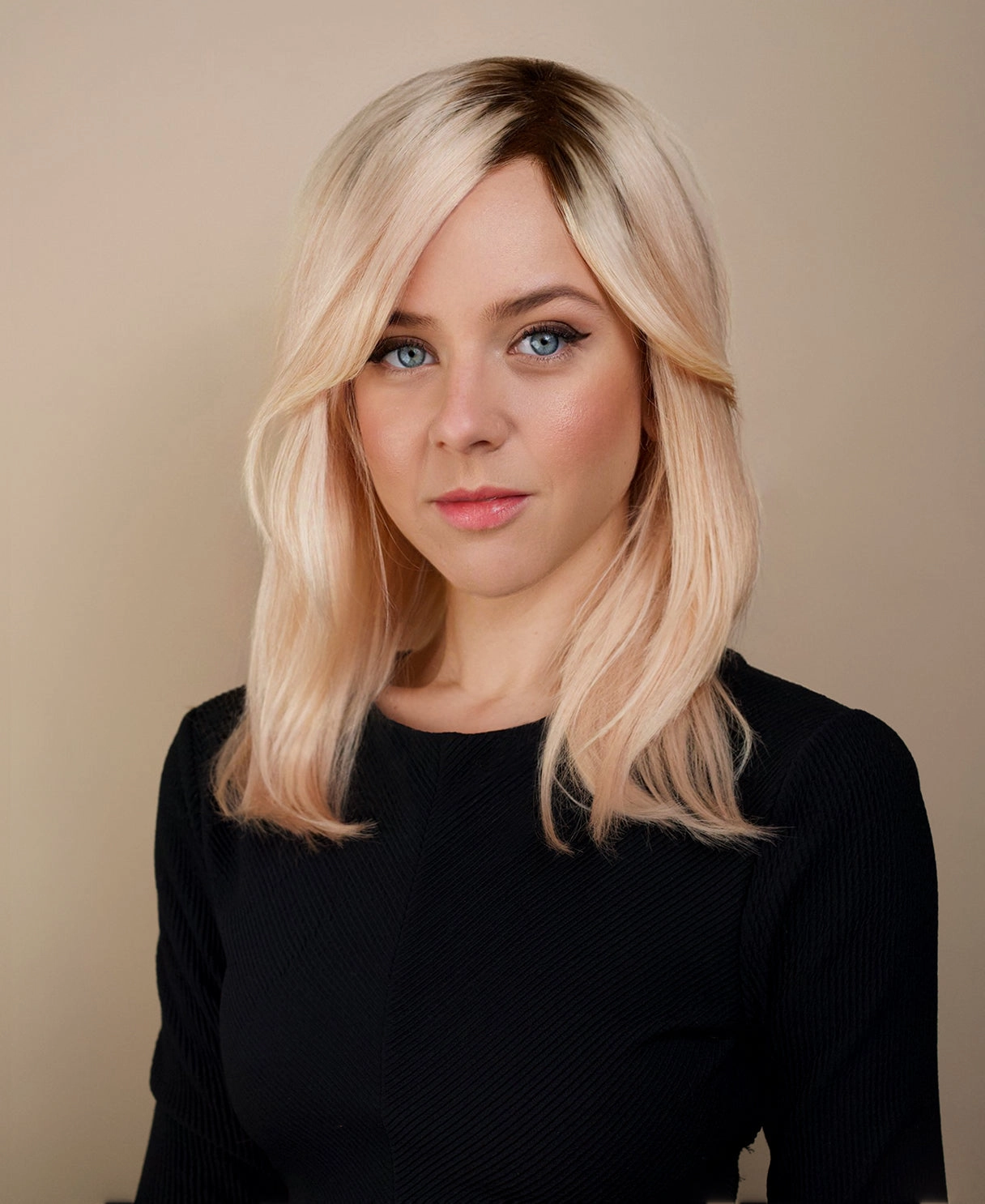 human hair wig with side bangs - 16" rooted blonde.