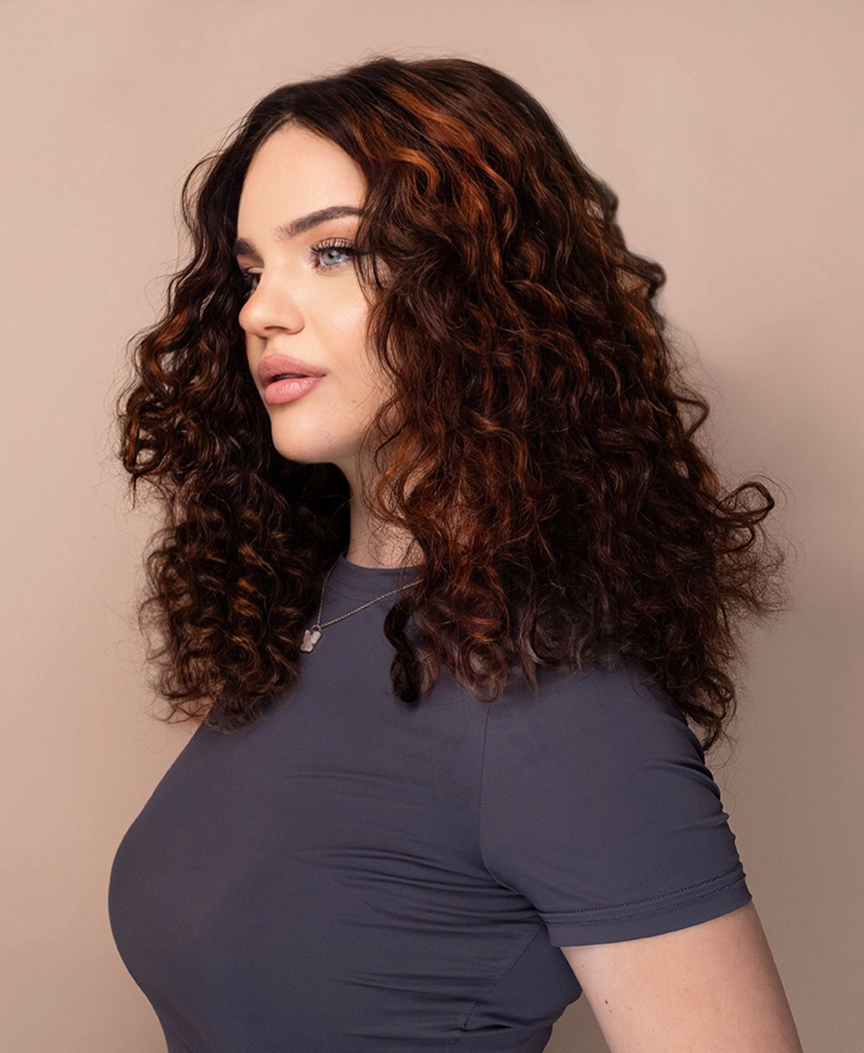 lace front human wig - 16" curly brown with highlights.