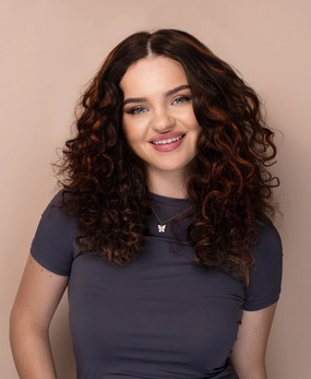 lace front human wig - 16" curly brown with highlights.