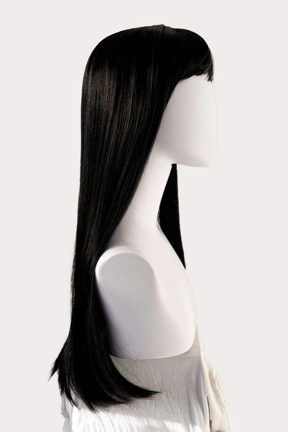 Long, black, straight wig with platinum fringe streak and retro, straight fringe: Imogen