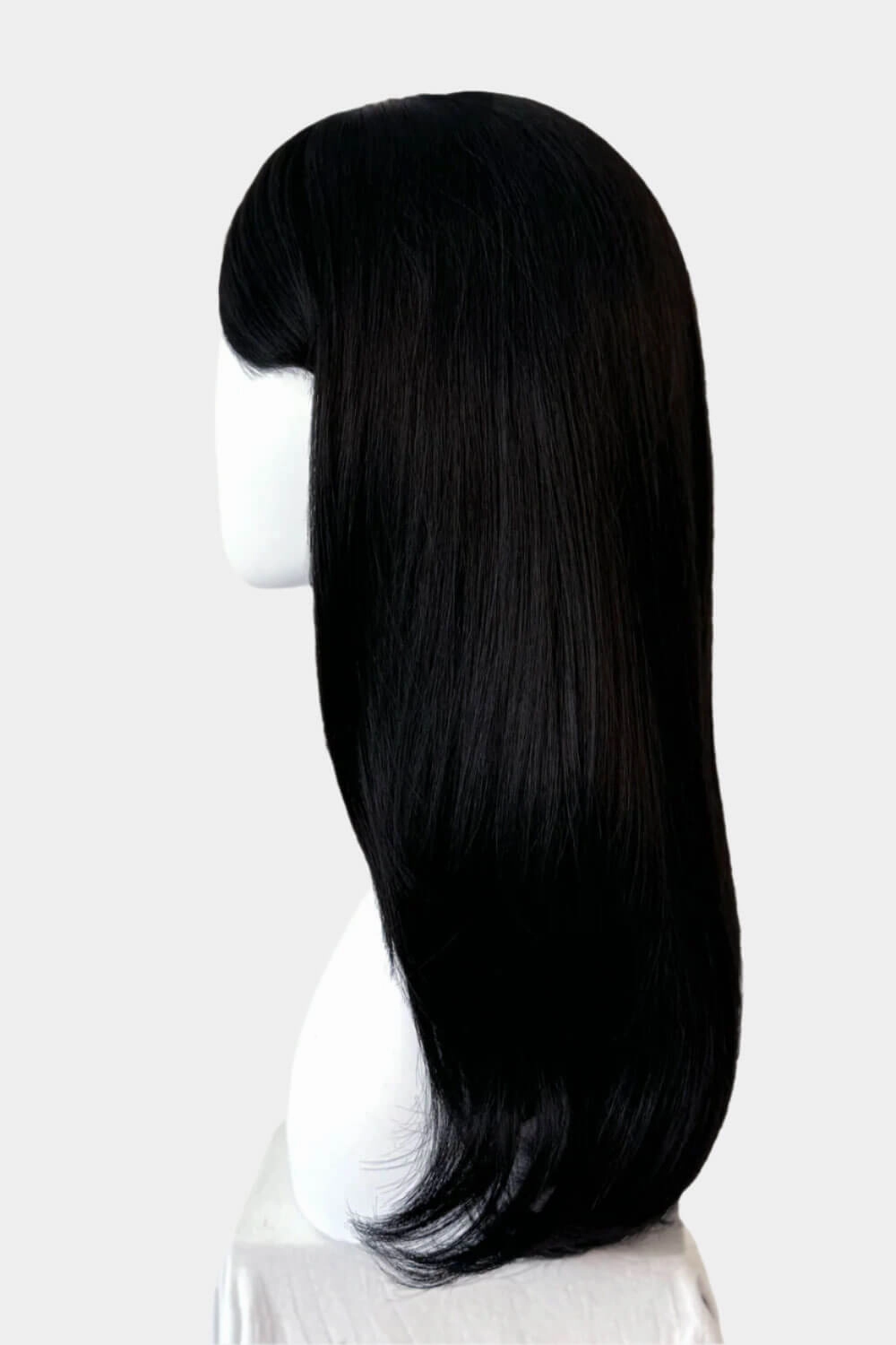 Long black wig, face frame style with full, sweeping fringe: Corina