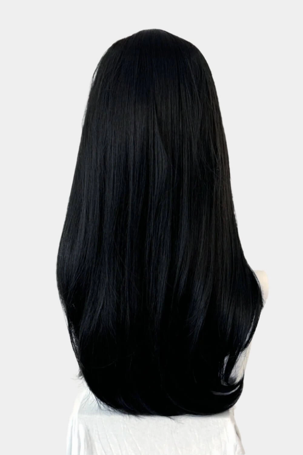 Long black wig, face frame style with full, sweeping fringe: Corina