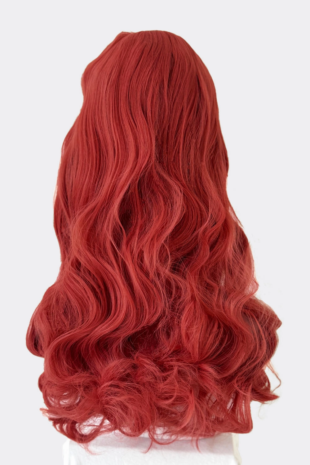 Long pastel-pink pinup style wig with gentle waves and short fringe: Candy