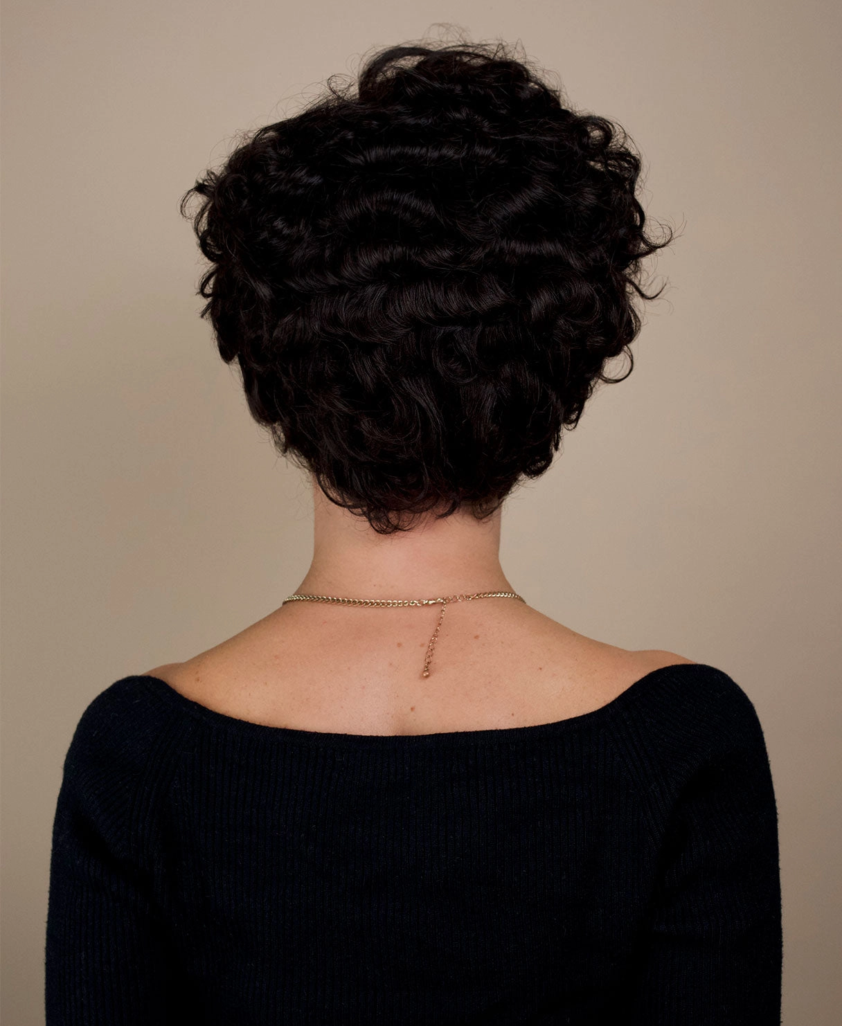 t-part curly human wig - 6" natural black.