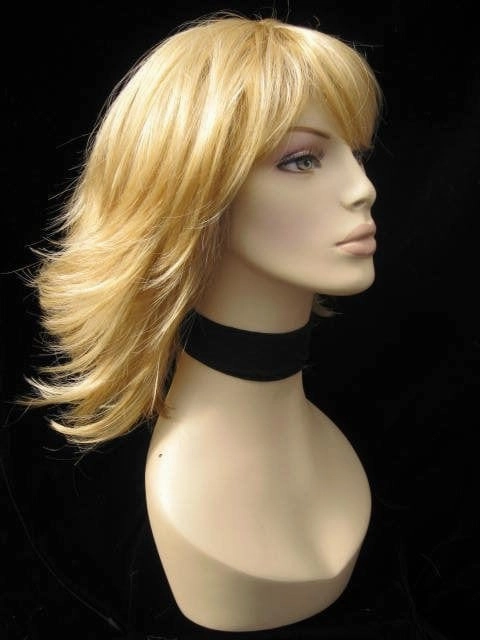 Warm blonde wig with flicked tips: Mary