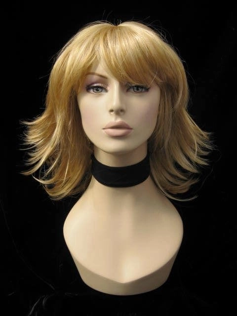 Warm blonde wig with flicked tips: Mary