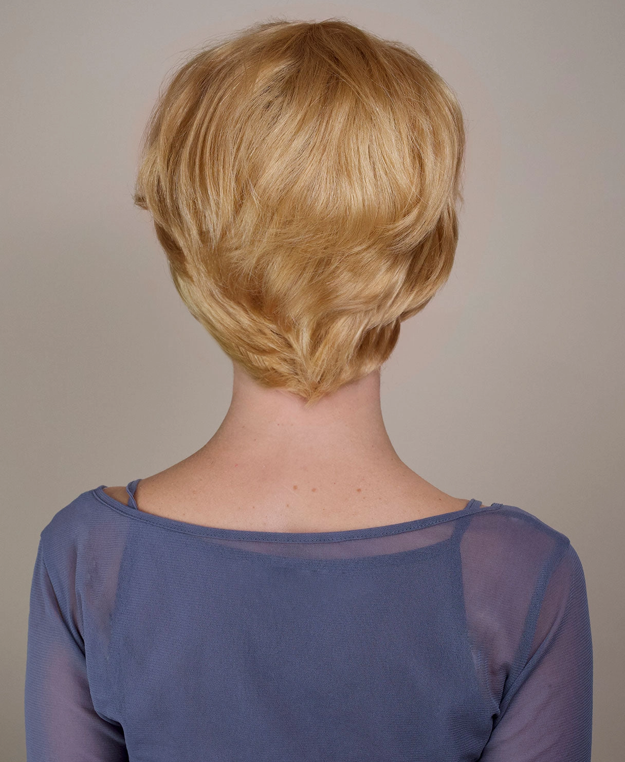 wedge cut human wig - 8" honey blonde.